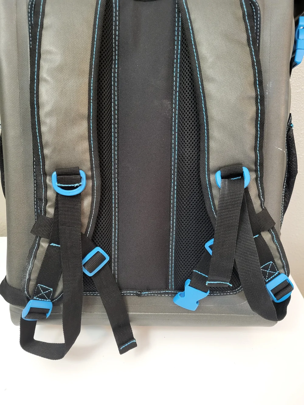 Magellan Outdoors Gray Waterproof Zip Top Backpack with Blue Accents